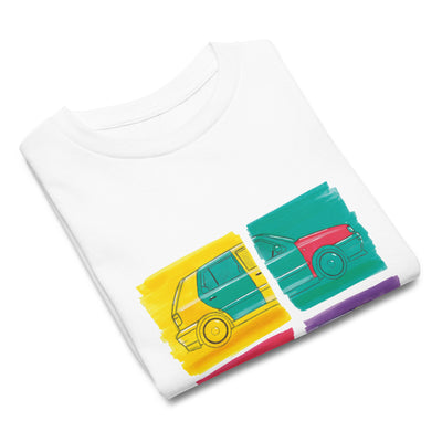 T-shirt blanc pour enfant plié avec au milieu une illustration représentant deux Volkswagen Golf Harlequin, de profil, dans un style Andy Warhol